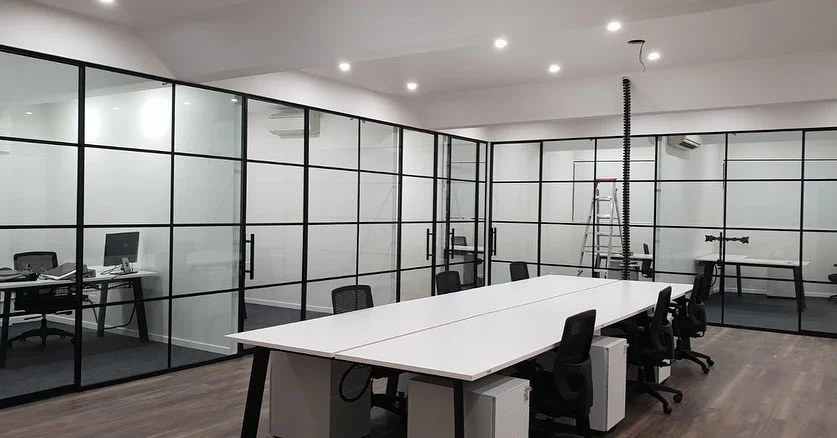 Office renovations with architectural glazed walls is completed. Please see before and after result