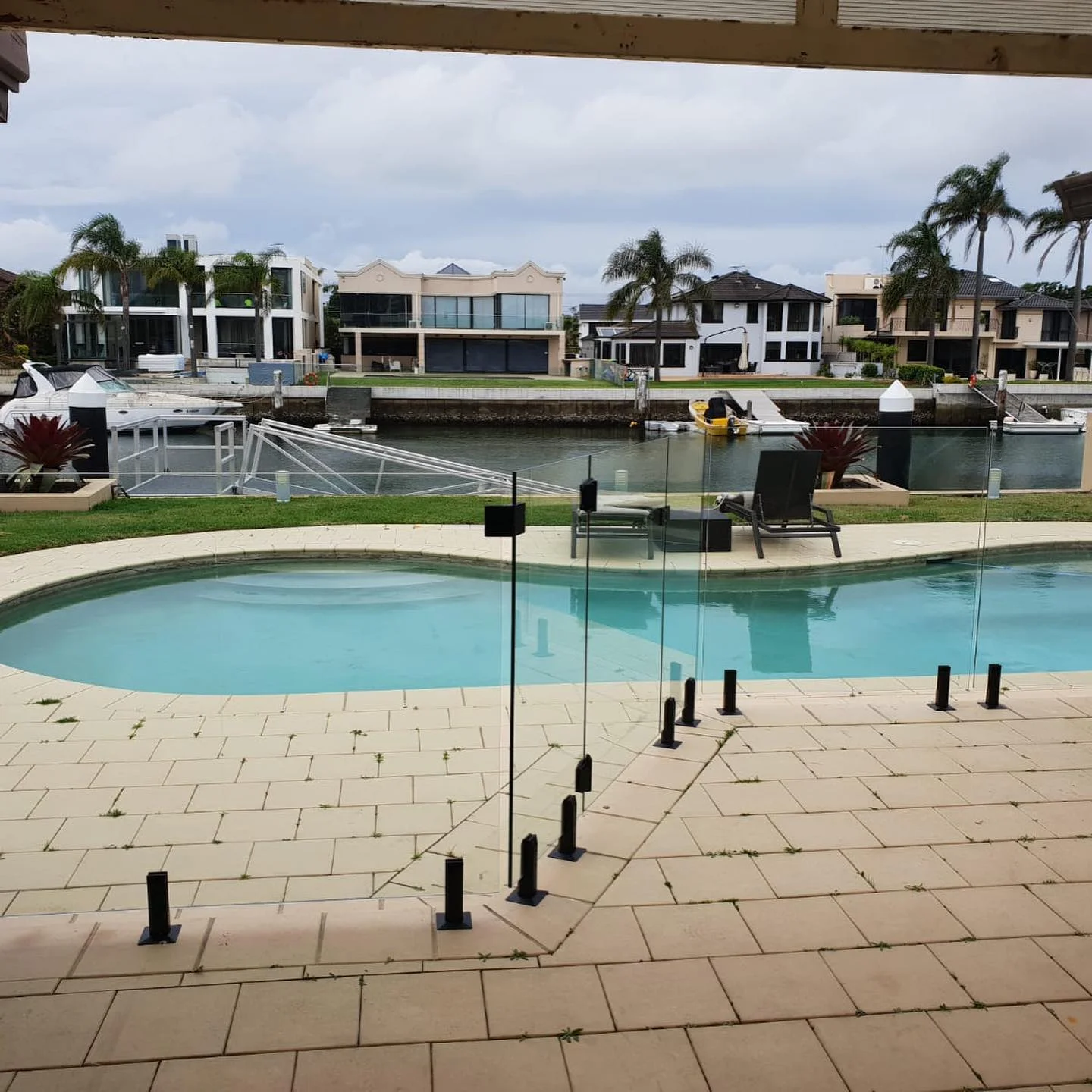 Custom made pool fence with black fittings