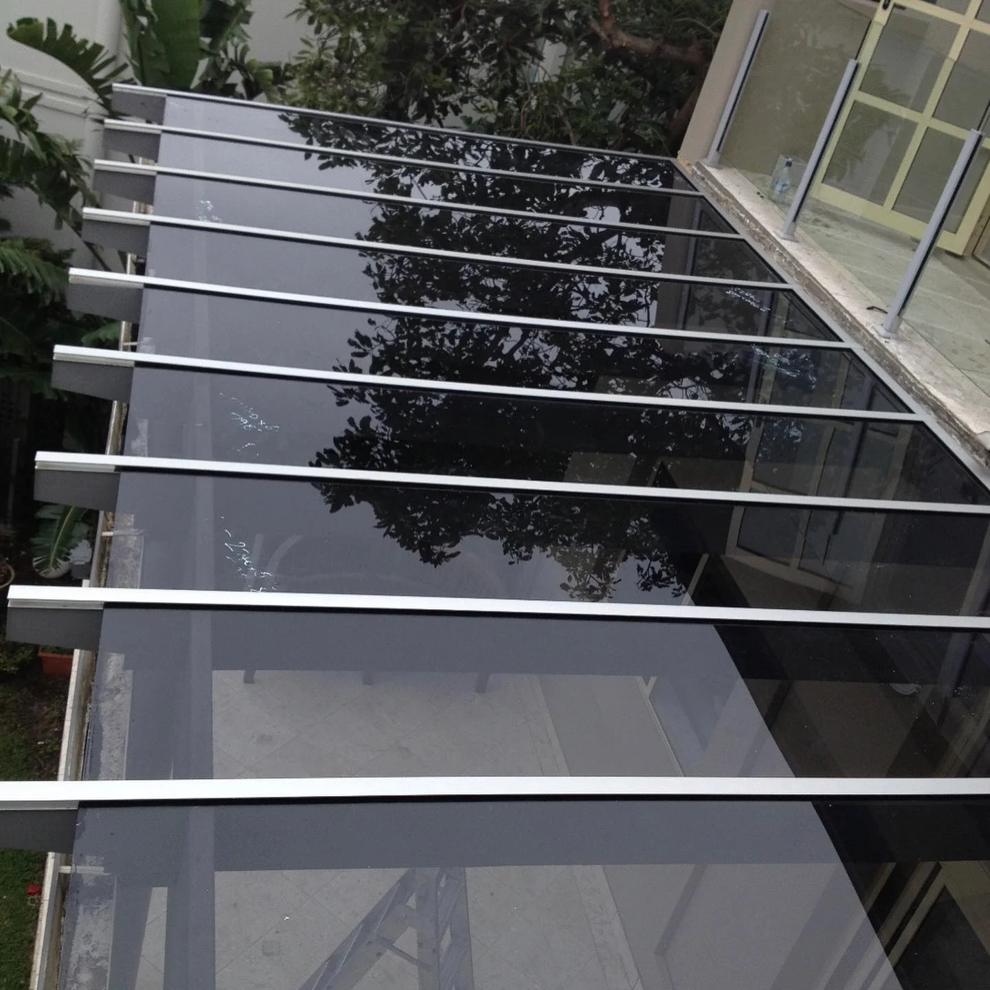 Glass awning
